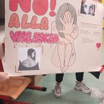 work in progress cartelloni no alla violenza raffigurante una donna maltrattata